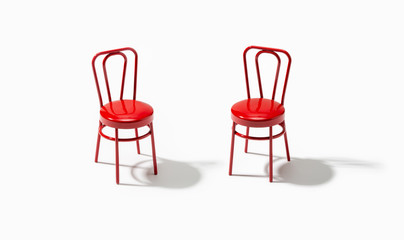 Fototapeta premium Two red chairs isolated on white background. Support or assistance concept