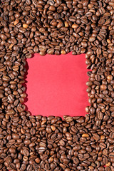 Coffee beans on a red background