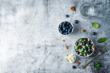 Obraz na płótnie Canvas Spinach blueberry walnut Feta salad
