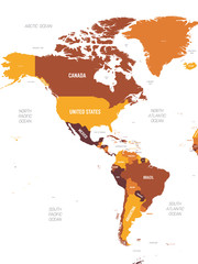 Americas map - brown orange hue colored on dark background. High detailed political map of North and South America continent with country, ocean and sea names labeling