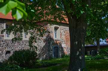 Fototapeta na wymiar Side view of a medieval village church in the state of Brandenburg, Germany.