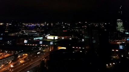 Fototapeta na wymiar High Angle Shot Of Illuminated Cityscape At Night