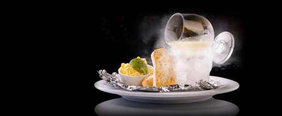 Pike caviar on dry ice with toast of toasted bread and butter