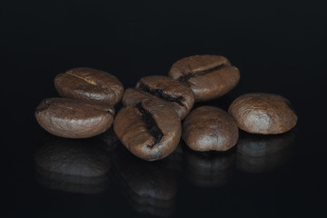 Coffee beans on a black background.