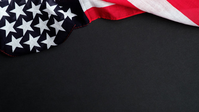 American flag on dark background. Banner mockup for Memorial Day or 4th of July Independence Day in United States.