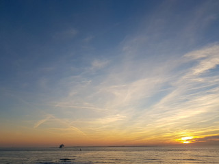 Naklejka na ściany i meble sunset on the west beach on Norderney