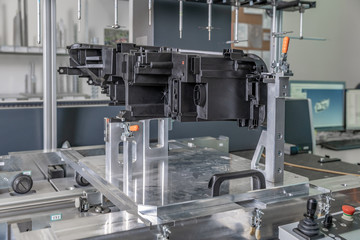 3D measuring device in a factory for the production of plastic castings for the automotive industry