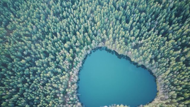 Aerial View of the Devil Lake Velnezers , Cortoks or Chortock Lake. A Transparent Velnezers Lake is 17 Meters Deep and Located the  Latgale Aglona, Latvia .