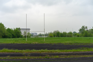 Overgrown Soccer Field with Treadmill