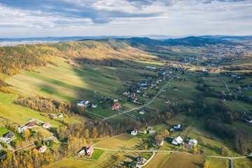 Iwkowa village country in Brzesko Poland. Polish mountains and hills aerial drone photo