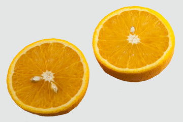 two half an orange on a white background