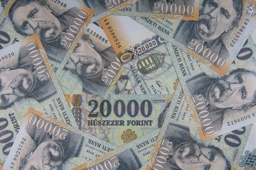 Stack of banknotes as background (Hungarian Forint) 20000 forint banknotes Ferenc Deak close up as a background. Europe Hungary. The all-seeing eye motif.