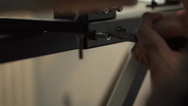 the hands of an engineer in heavy and light industry