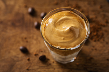 Dalgona coffee with whipped foam in cup