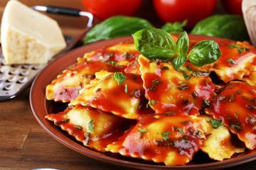 Ravioli with tomato sauce and basil. Fresh homemade ravioli