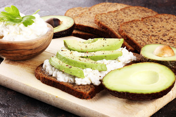 Sandwich with avocado with cream cheese for a healthy breakfast concept