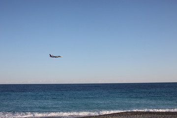 airplane landing, mediterranean sea, nice, france