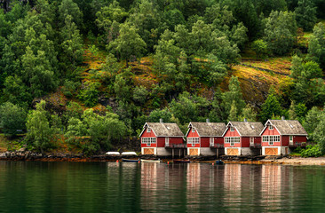 Boat sheds and huts on the fjord coast in Norway