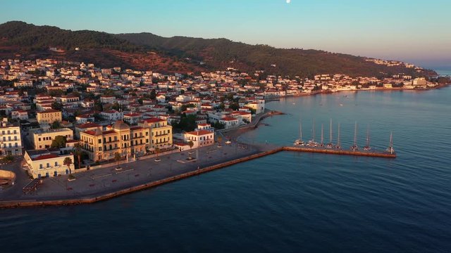 Greek island of Spetses in the Mediterranean Sea at sunrise.