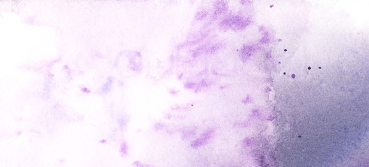 Abstract watercolor gentle background of lilac shades. Soft violet stains and bright small paint splashes on textured paper. Hand drawn illustration in pastel tones
