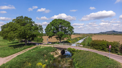 A pretty village cottage next to a countryside river in Somerset. 