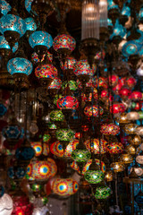 Bright colorful multicolored traditional Turkish lanterns hanging out at a bazaar.