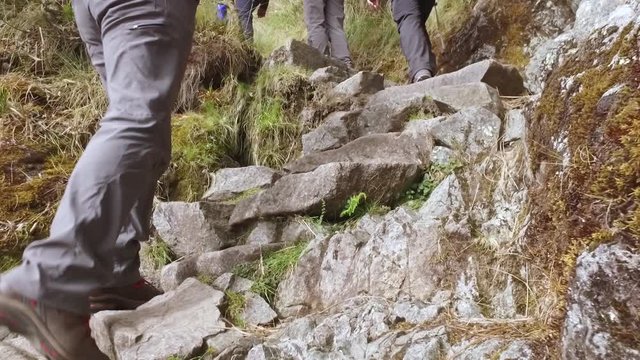 Slow motion, group of people hiking on Inca trail. Cusco, Peru