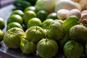 Close up of some fresh tomatillo on a table