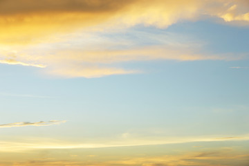 Golden clouds with blue sky.
