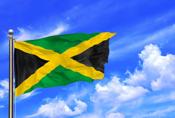 Jamaica Black Green Yellow Gold National Flag Waving In The Wind On A Beautiful Summer Blue Sky