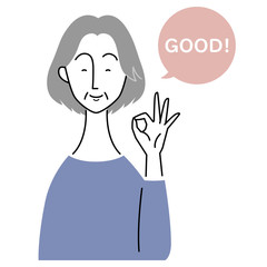 "GOOD"のジェスチャーをする年配女性