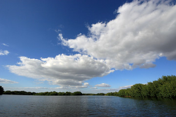 Dramatic cloudscape over Paurotis Pond in Everglades National Park, Florida on autumn afternoon.