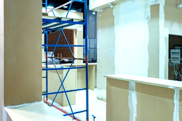 Renovation in the office space. Installation of partitions. Installation of drywall partitions. Office building renovation. Services of construction teams. Turnkey office finishing.