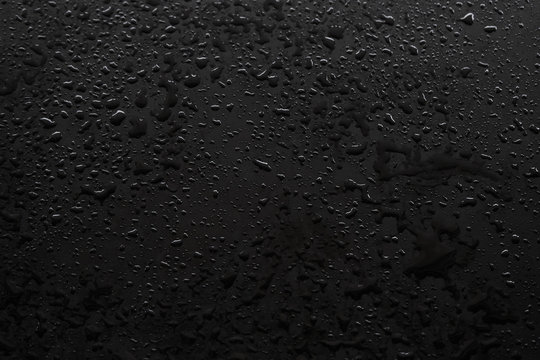 Waterdrops on the black floor