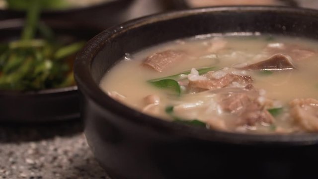 Korean traditional food, Pork and Rice Soup, Dwaeji-gukbap. It's very popular especially in Busan, South Korea.