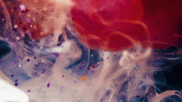 Colorful liquid moving in water