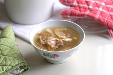 Chinese traditional american ginseng soup served in a bowl.