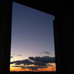 Scenic View Of Sky At Dusk Seen From Window