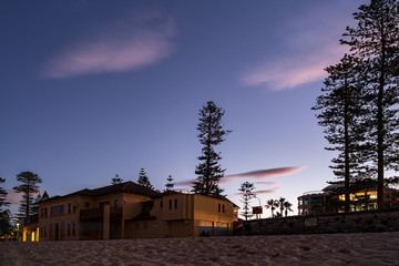 Fototapeta na wymiar North Steyne Surf Club at Manly Beach, Sydney, Australia in sunset light.