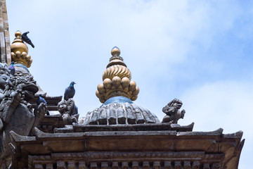 One of the gajur and stone carvings at Krishna Mandir(Krishna Temple) located in Patan Durbar Square