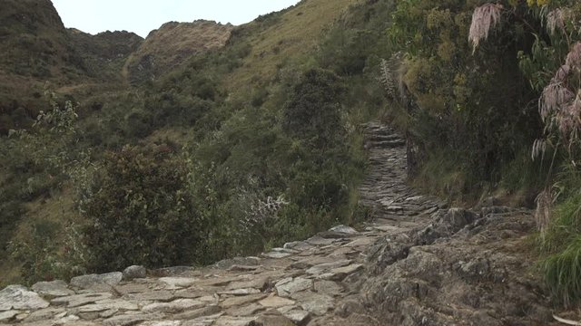 Stone path on Inca trail to Machu Picchu. Cusco, Peru