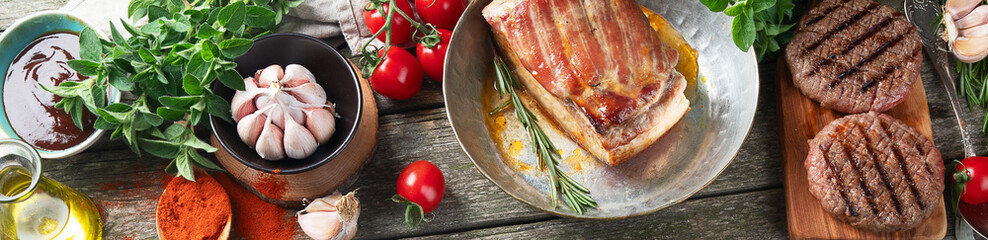 Grilled meat  on rustic wooden table