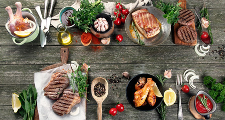 Grilled meat  on rustic wooden table