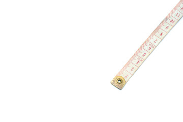 Close up old, yellowish tape measure for tailor sewing cloth over white background.