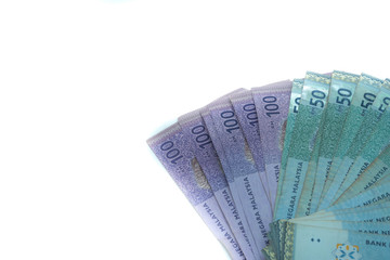 Malaysia banknotes, RM 50 and RM 100 over the white background.