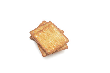 Close up cream crackers over white background. Isolated image.