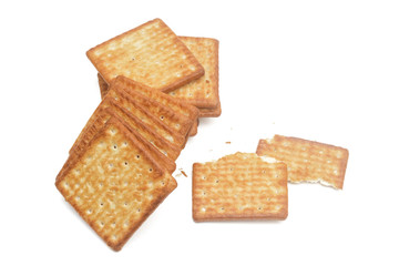 Close up cream crackers over white background. Isolated image.