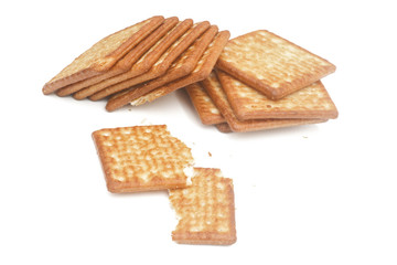 Close up cream crackers over white background. Isolated image.
