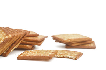 Close up cream crackers over white background. Isolated image.