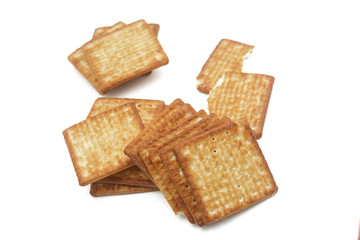 Close up cream crackers over white background. Isolated image.